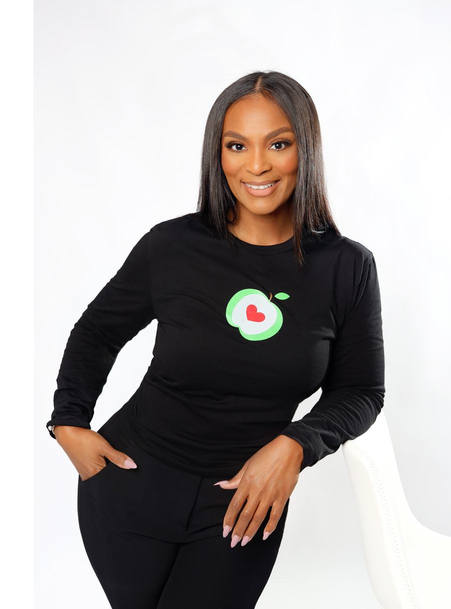 A warm smile and a branded black tee on white
